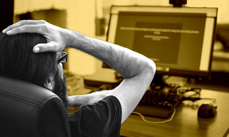 Senior software developer reviewing AI-generated code in IDE – AI slows down experienced developers