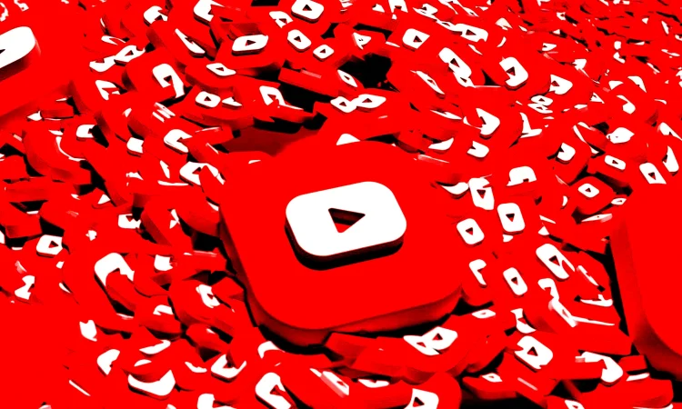 YouTube logo with AI-generated video graphics, highlighting AI-generated content
